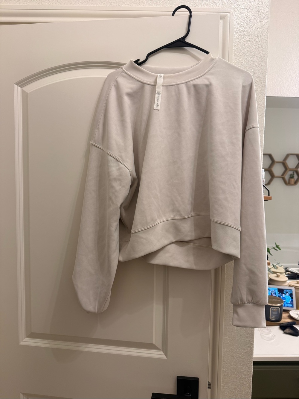 Lululemon soft stream perfectly oversized cropped crew in color white opal.